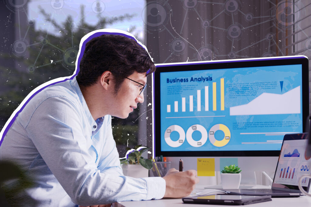 man in front of a computer doing narrative mining