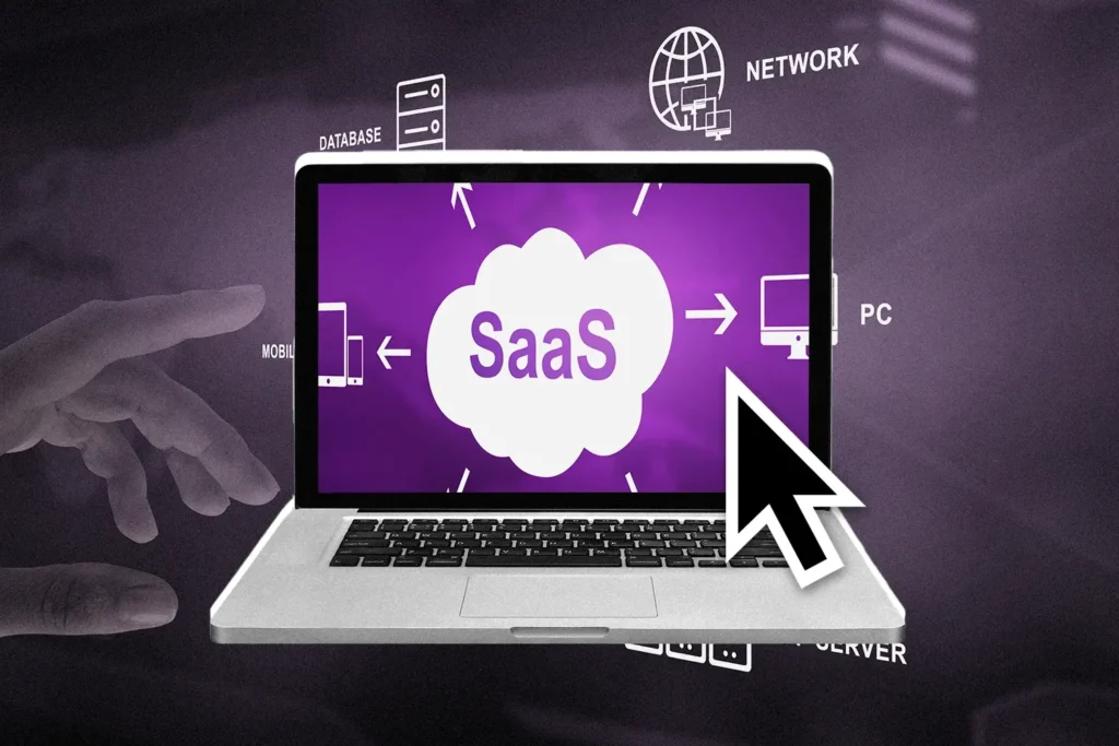 A laptop showing some SaaS and SEO symbols.