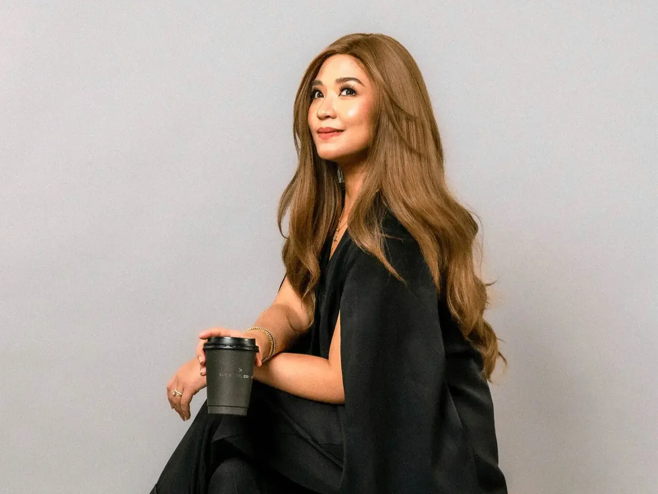 Anna-Magalona-holding-a-coffee-cup-1280x1602 - M2.0 Communications Inc.