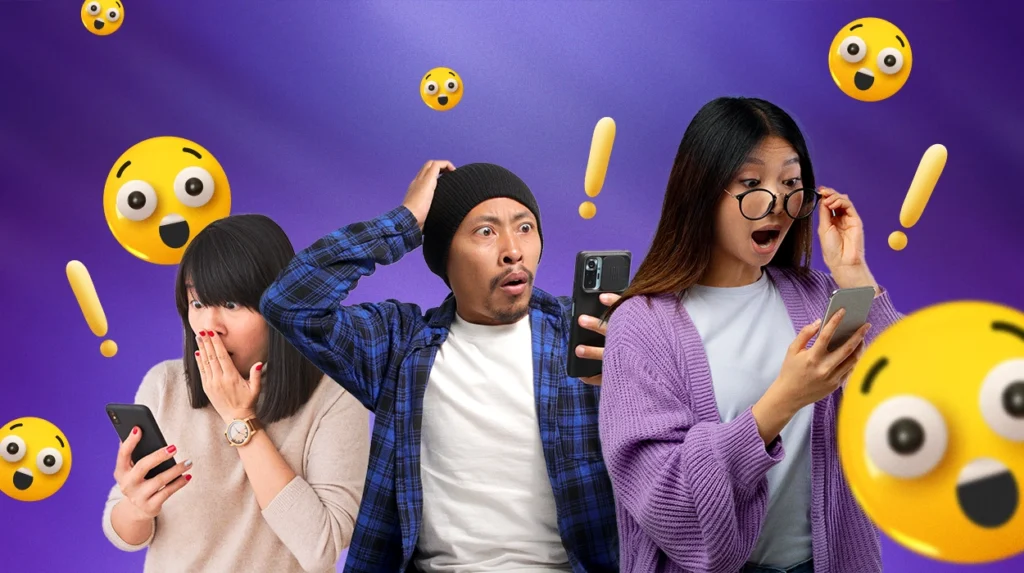 Three people reacting with surprise to their phones, with emojis and exclamation marks around them—showing attention-grabber tactics in digital marketing.
