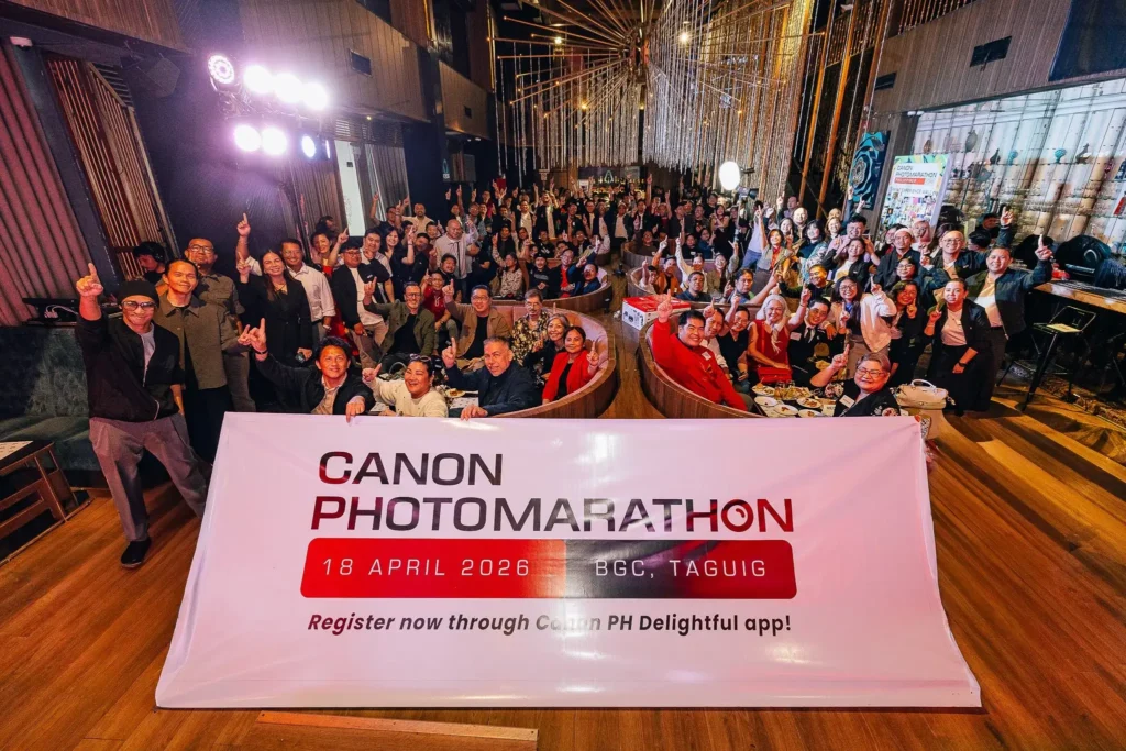 Attendees posing with the Canon Photomarathon Philippines 2026 banner at the creator event featured in this tech PR campaign case study.